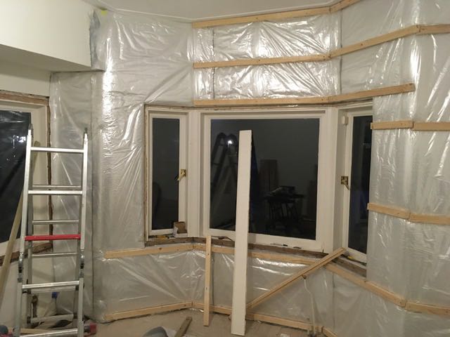 Opbouw voorzetwand met isolatie